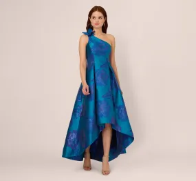 Floral Jacquard One Shoulder High Low Gown With Rosette Accent In Teal Blue